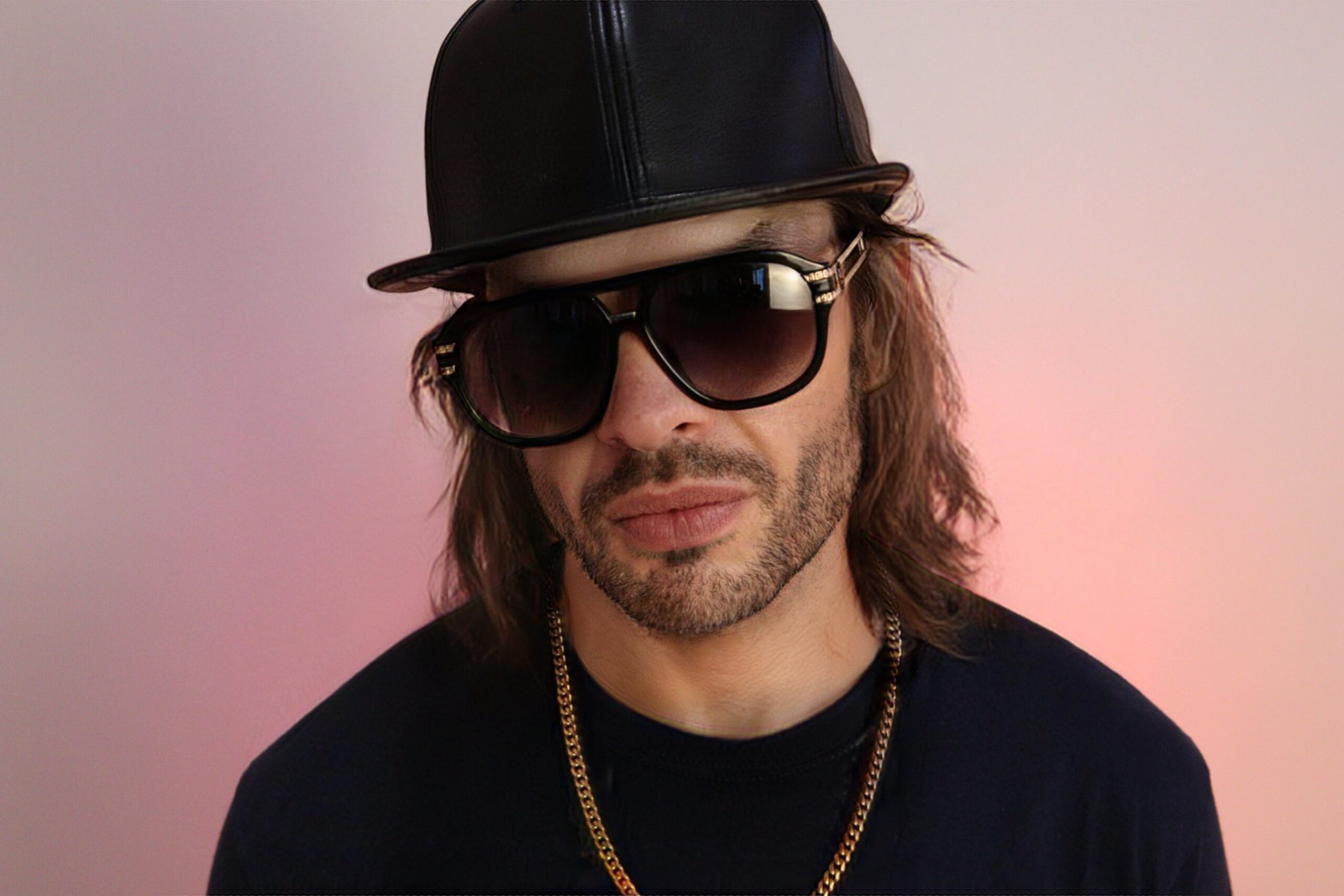 male artist starkillers dj wearing glasses black hat zilliqa